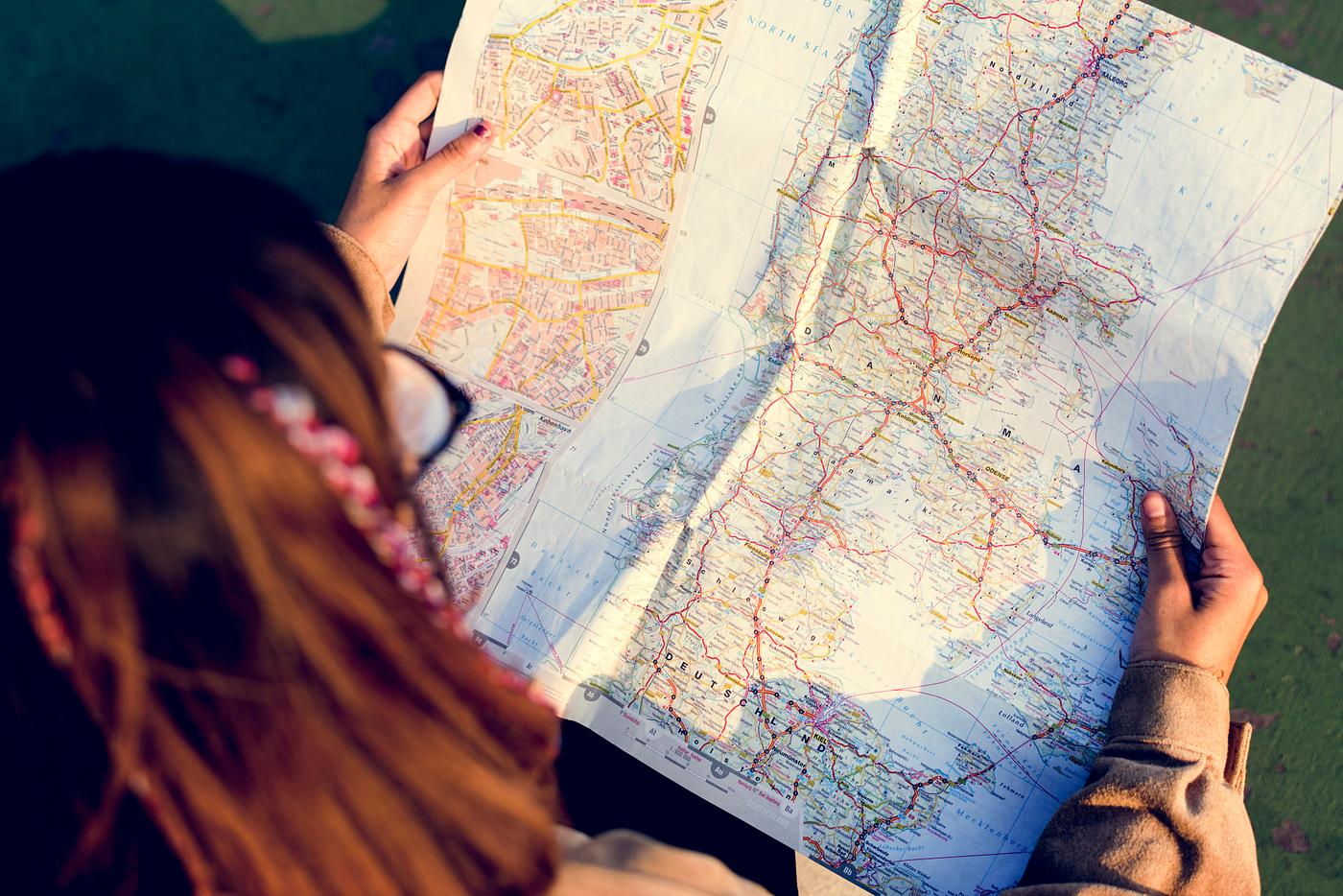 girl, woman, aerial, holding, map, directions, guide, location, travel, navigation girl, woman, aerial, holding, map, directions, guide, location, travel, navigation