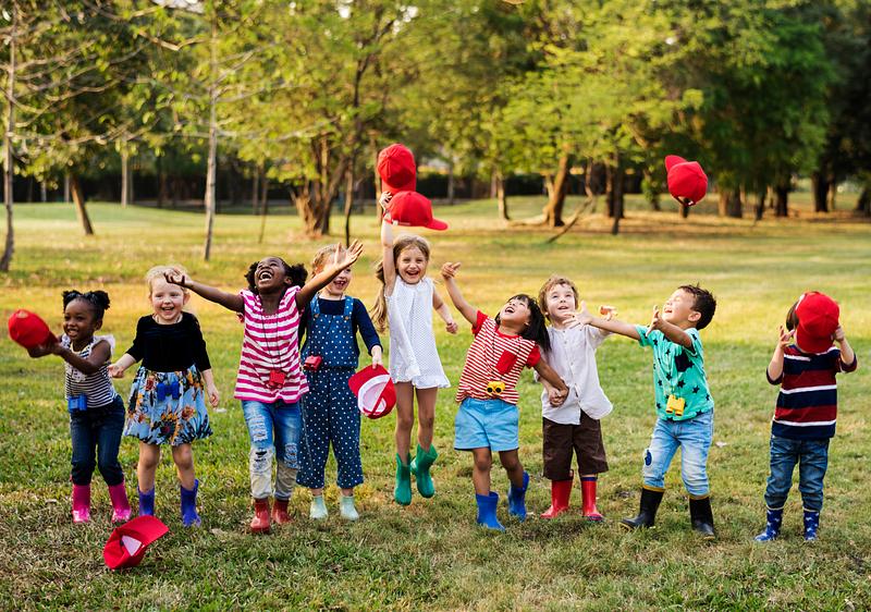 Group of Diverse Kids Playing at the Field Together | Royalty free
