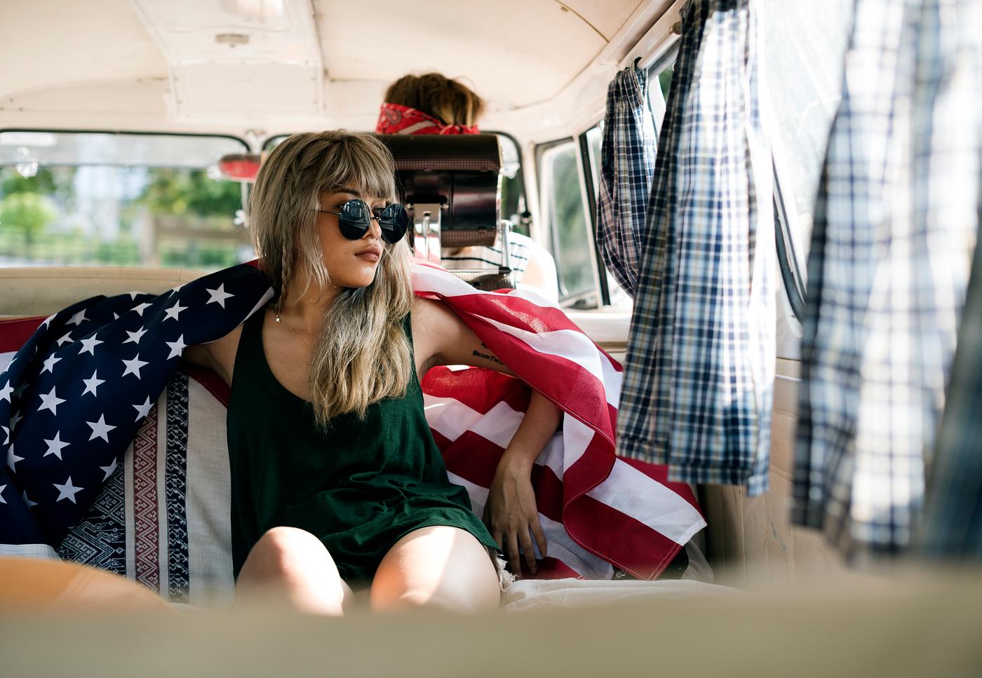 Diverse group of people enjoying a road trip and festival - american flag, van, adult, adventure, america, american,... Diverse group of people enjoying a road trip and festival - american flag, van, adult, adventure, america, american,...
