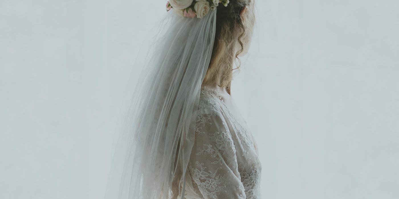 Back view of a bride in a wedding dress Back view of a bride in a wedding dress