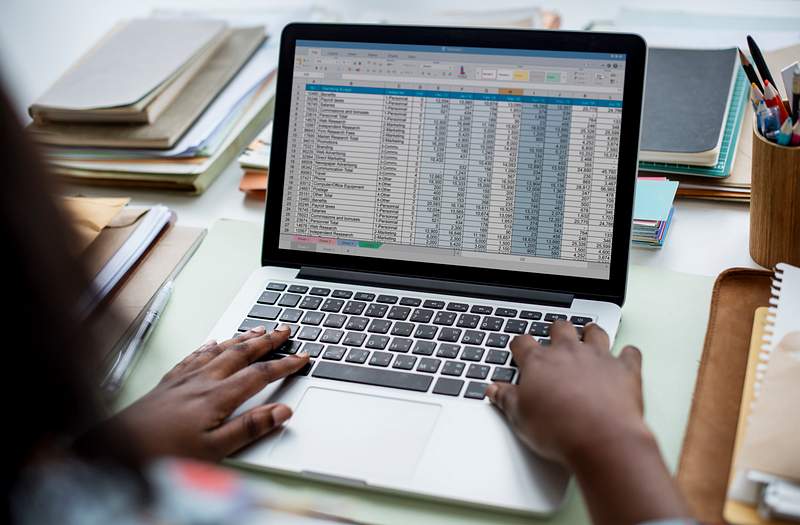 Restaurant Inventory Management 101: Importance Of Inventory Management For Restaurants And Takeaways 2 Woman working with data on the laptop