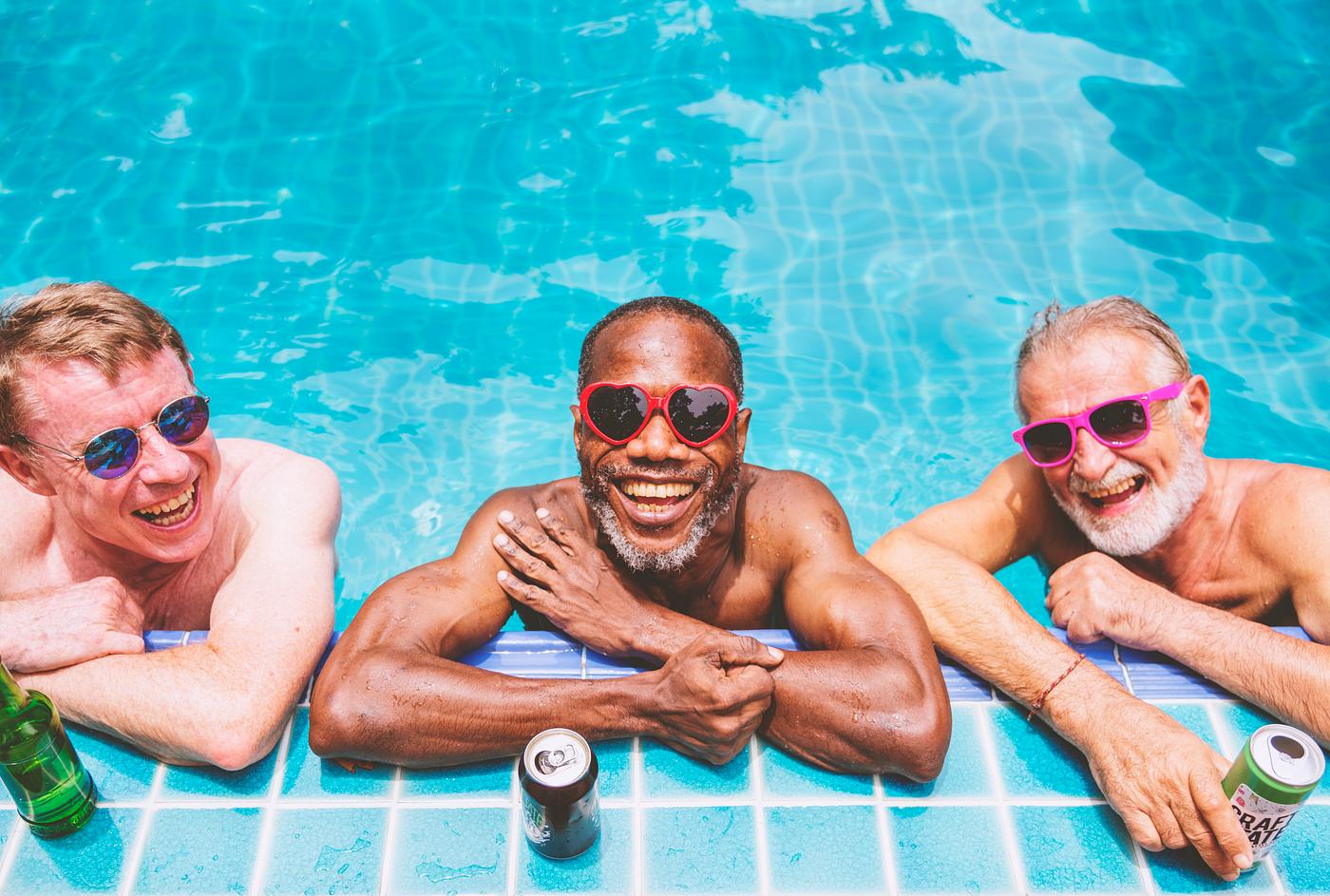Group of diverse senior men enjoying the pool together - summer, beverage, closeup, diverse, drinks, enjoy, enjoyment,... Group of diverse senior men enjoying the pool together - summer, beverage, closeup, diverse, drinks, enjoy, enjoyment,...