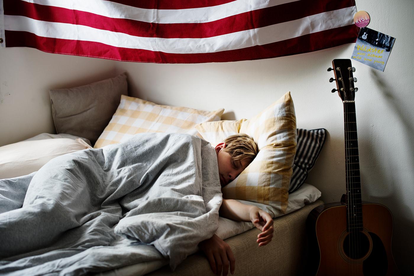 Young caucasian boy sleeping in bed Young caucasian boy sleeping in bed