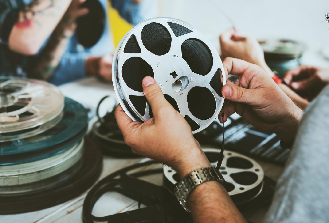 Hand hold a film strip Hand hold a film strip