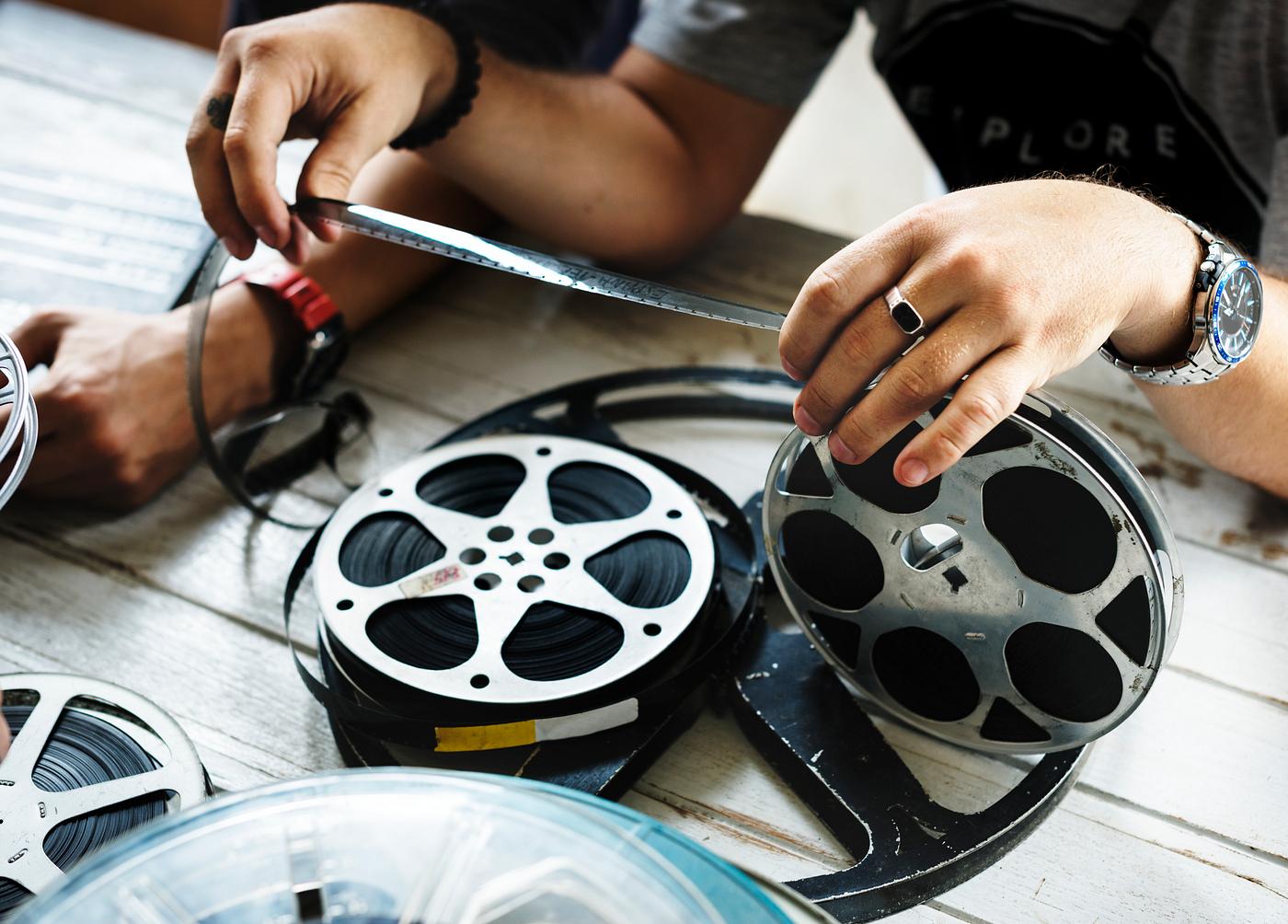 Hand hold a film strip Hand hold a film strip