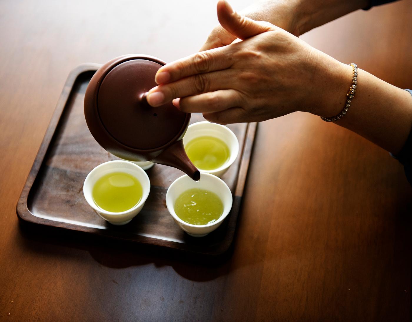 Pouring tea Pouring tea