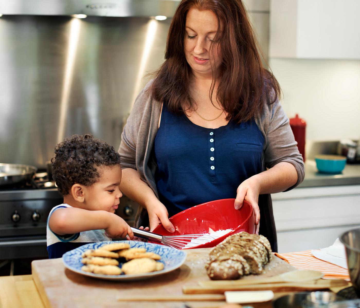 Family baking together in the kitchen - cooking, activity, african, african american, african descent, bakery, baking, black... Family baking together in the kitchen - cooking, activity, african, african american, african descent, bakery, baking, black...