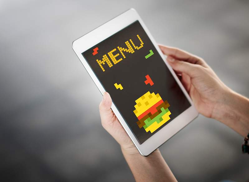 8 bit illustration of tasty burger meal on digital tablet 