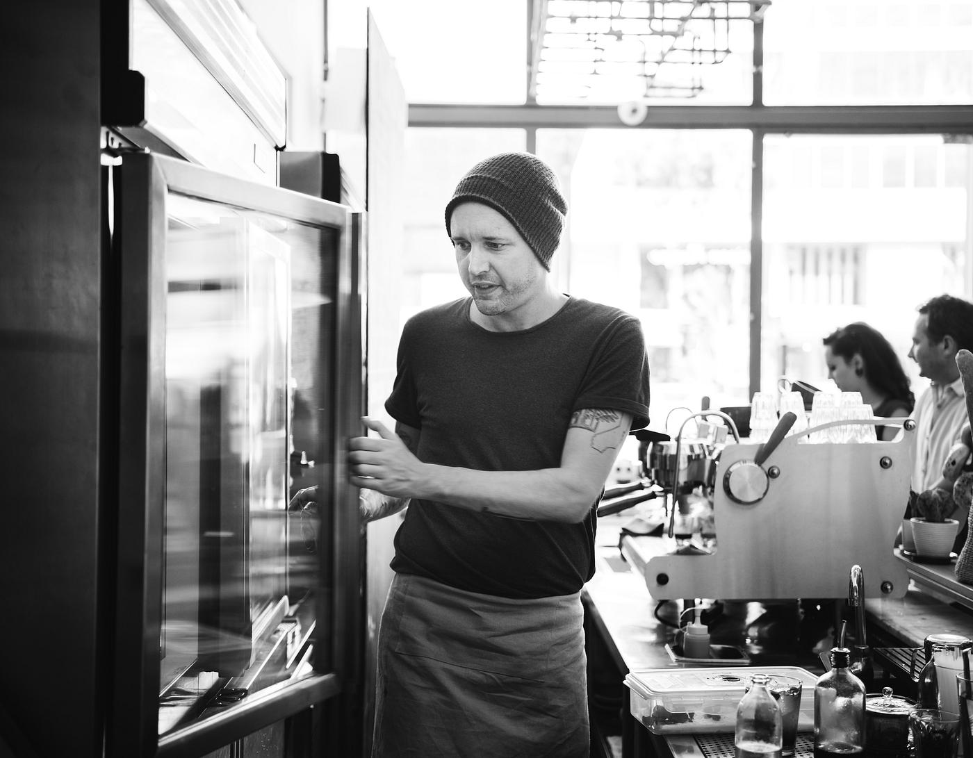 Barista man is working in a coffee shop - barista, beverage, business, cafe, caucasian, coffee, coffee shop, consume,... Barista man is working in a coffee shop - barista, beverage, business, cafe, caucasian, coffee, coffee shop, consume,...