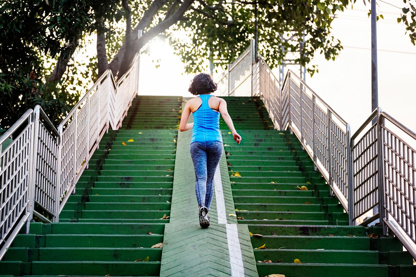 A woman jogging through the city - workout, running, city, exercise, training, urban, run, park, jogging, jogger, attractive... A woman jogging through the city - workout, running, city, exercise, training, urban, run, park, jogging, jogger, attractive...