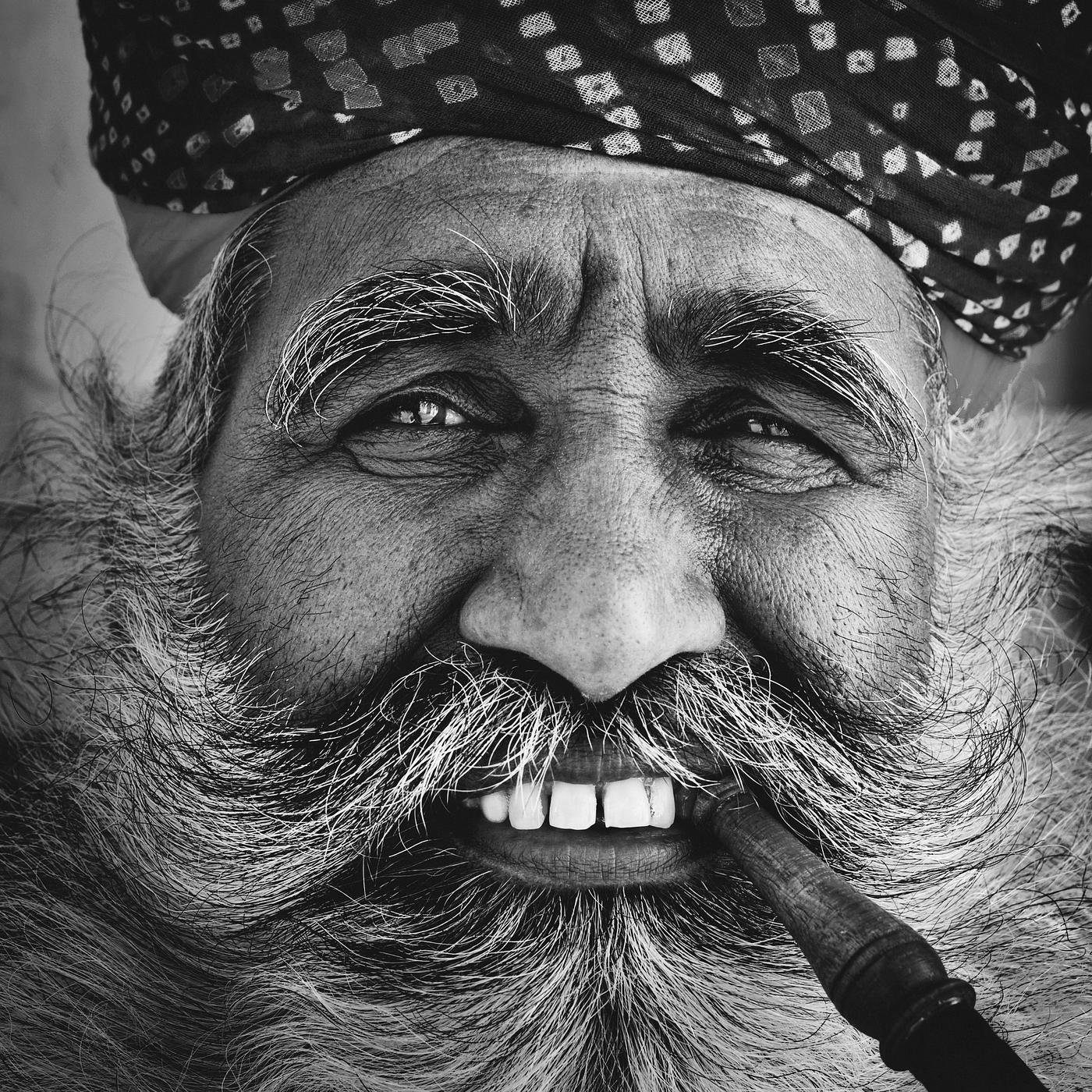 Bearded Indian man smoking a pipe - adult, asia, beard, brahmin, characters, face, fine art portrait, human face, india,... Bearded Indian man smoking a pipe - adult, asia, beard, brahmin, characters, face, fine art portrait, human face, india,...