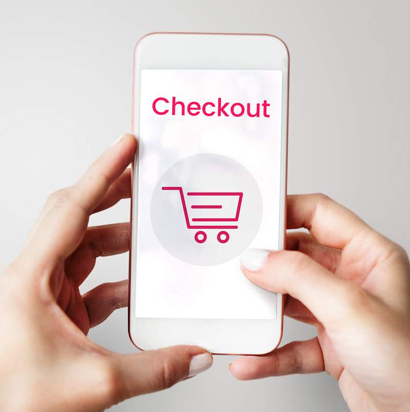 How To Choose A Restaurant's Domain Name - 4 Simple Steps 4 Hands working on digital device network graphic overlay