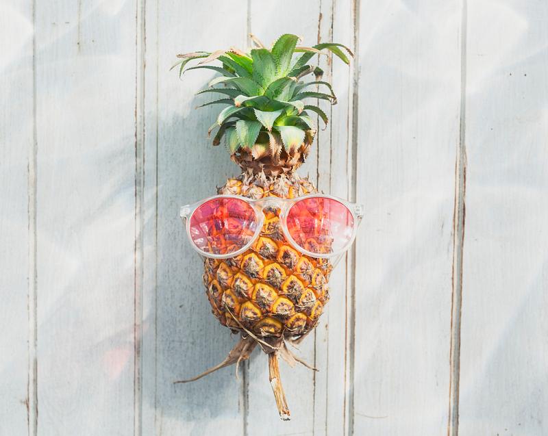 A pineapple with sunglasses A pineapple with sunglasses