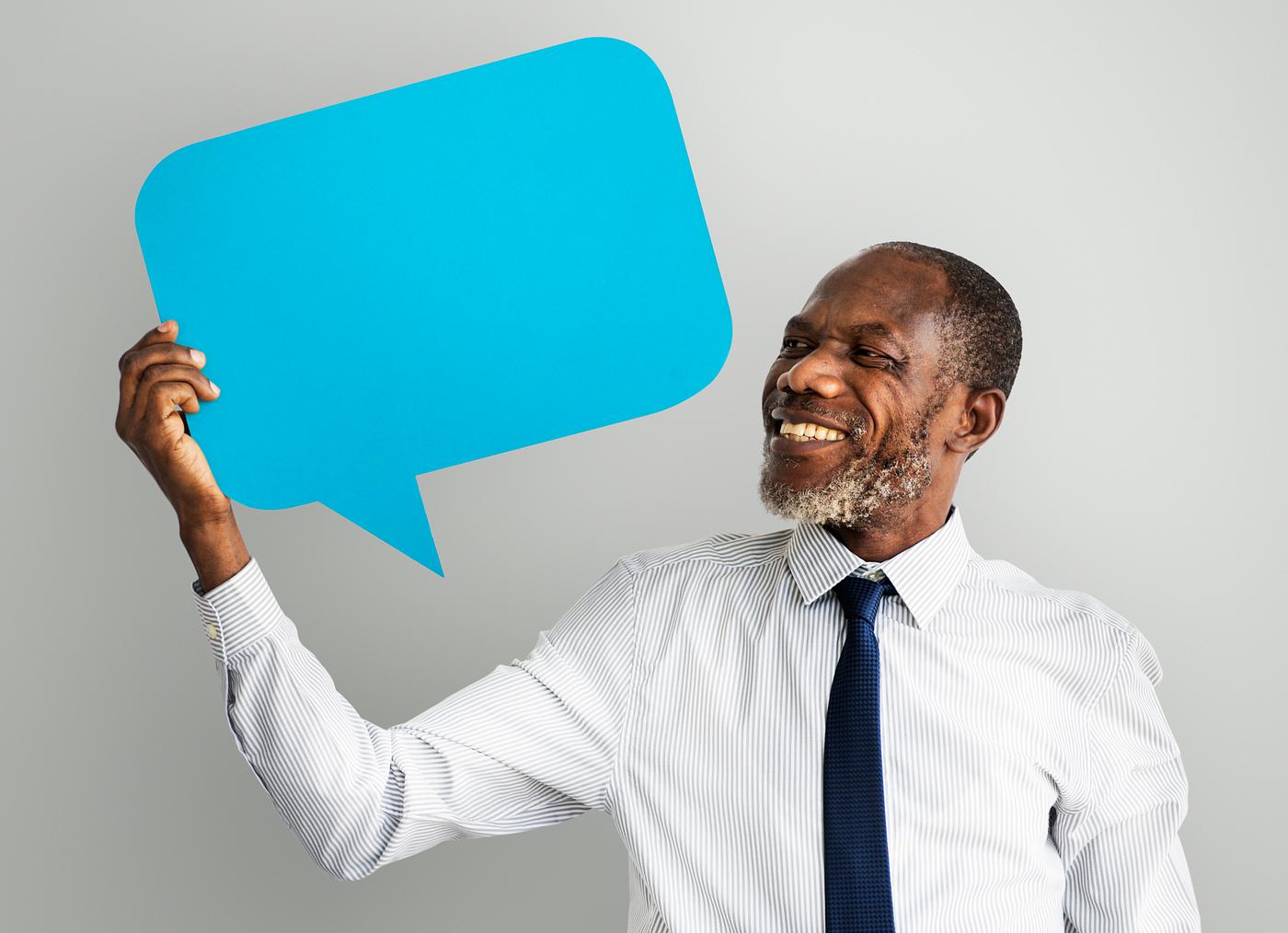 copy space, african, holding, joy, contact, business, happy, speech bubble, conversation, speaking, cheerful, smiling, man,... copy space, african, holding, joy, contact, business, happy, speech bubble, conversation, speaking, cheerful, smiling, man,...