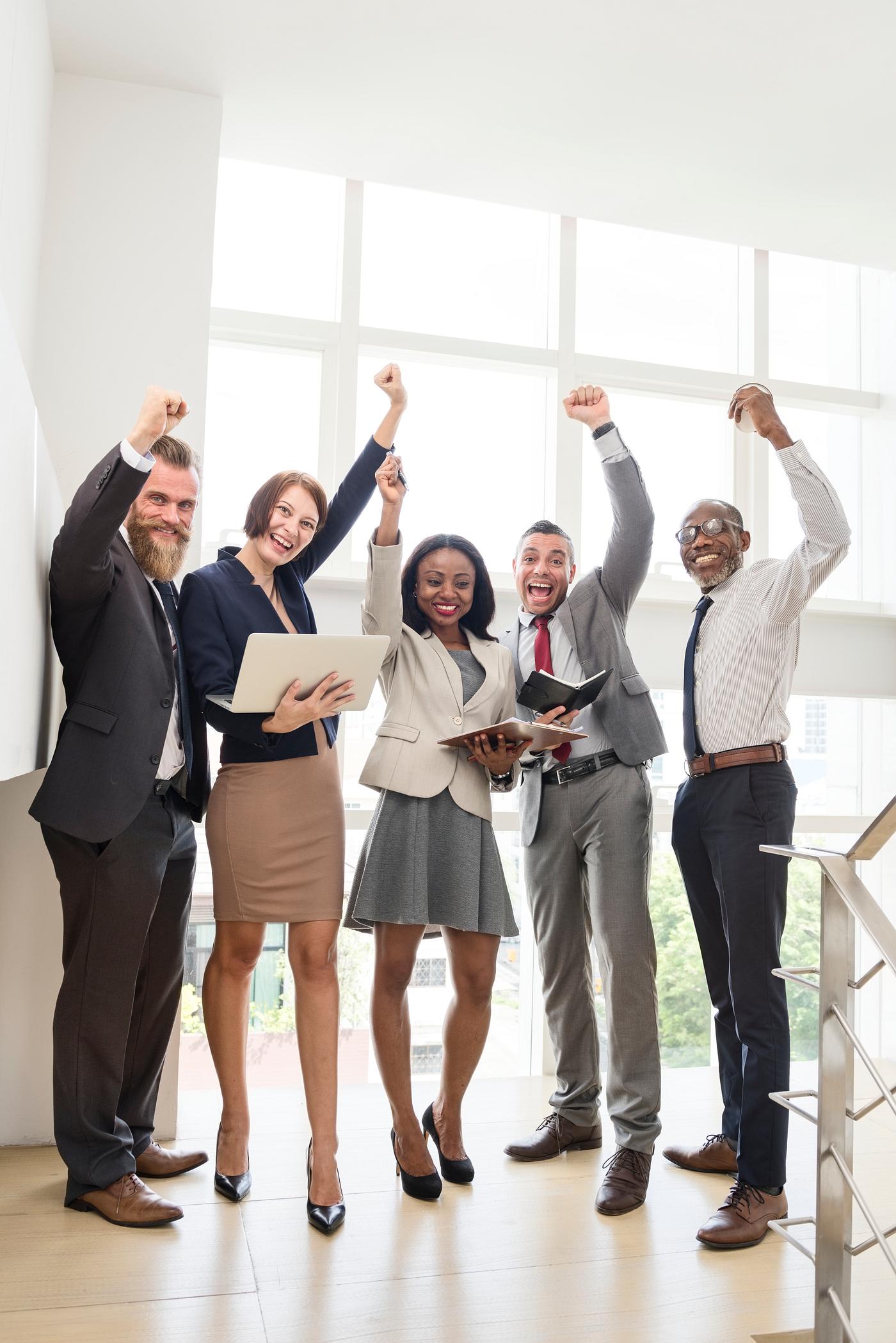 Business people with raised arms - achievement, african descent, arm raised, black, brainstorming, business, caucasian,... Business people with raised arms - achievement, african descent, arm raised, black, brainstorming, business, caucasian,...