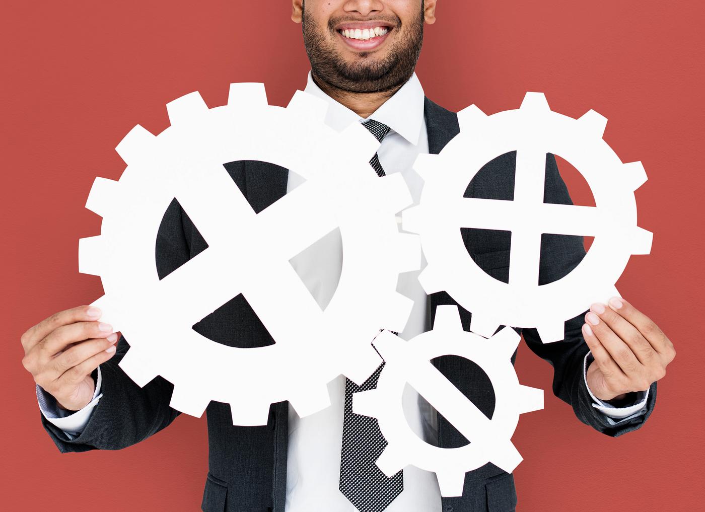 studio, progress, expression, person, holding, people, teamwork, gear, smile, cheerful, smiling, isolated, orange,... studio, progress, expression, person, holding, people, teamwork, gear, smile, cheerful, smiling, isolated, orange,...