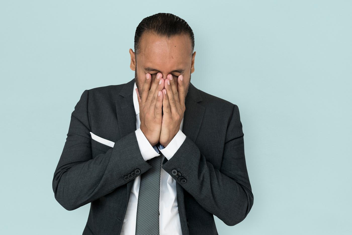 Stressed man rubbing his eyes - adult, background, business, closed, disappointed, ethnicity, expression, face, female,... Stressed man rubbing his eyes - adult, background, business, closed, disappointed, ethnicity, expression, face, female,...