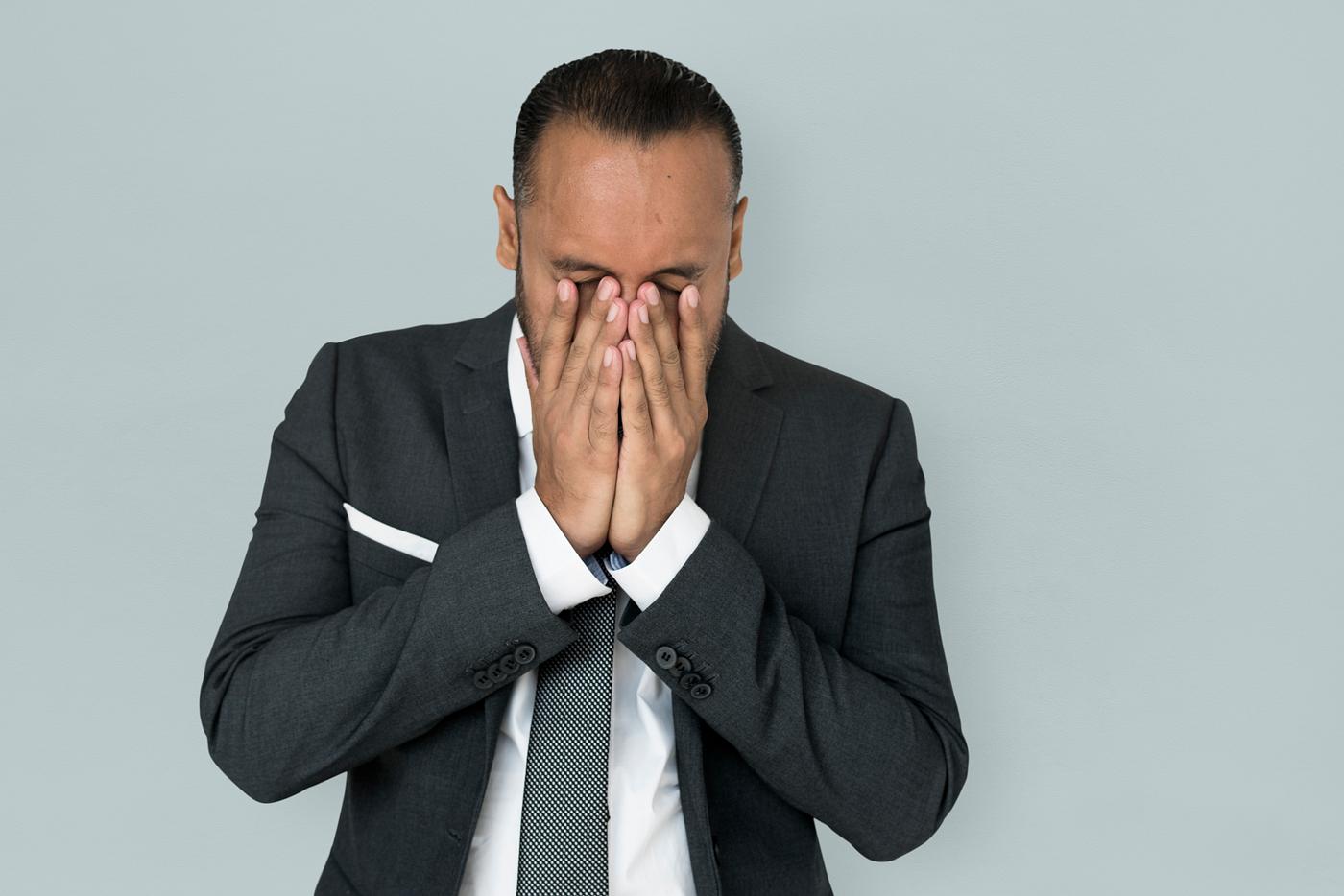 Stressed man rubbing his eyes - adult, background, business, closed, disappointed, ethnicity, expression, face, female,... Stressed man rubbing his eyes - adult, background, business, closed, disappointed, ethnicity, expression, face, female,...