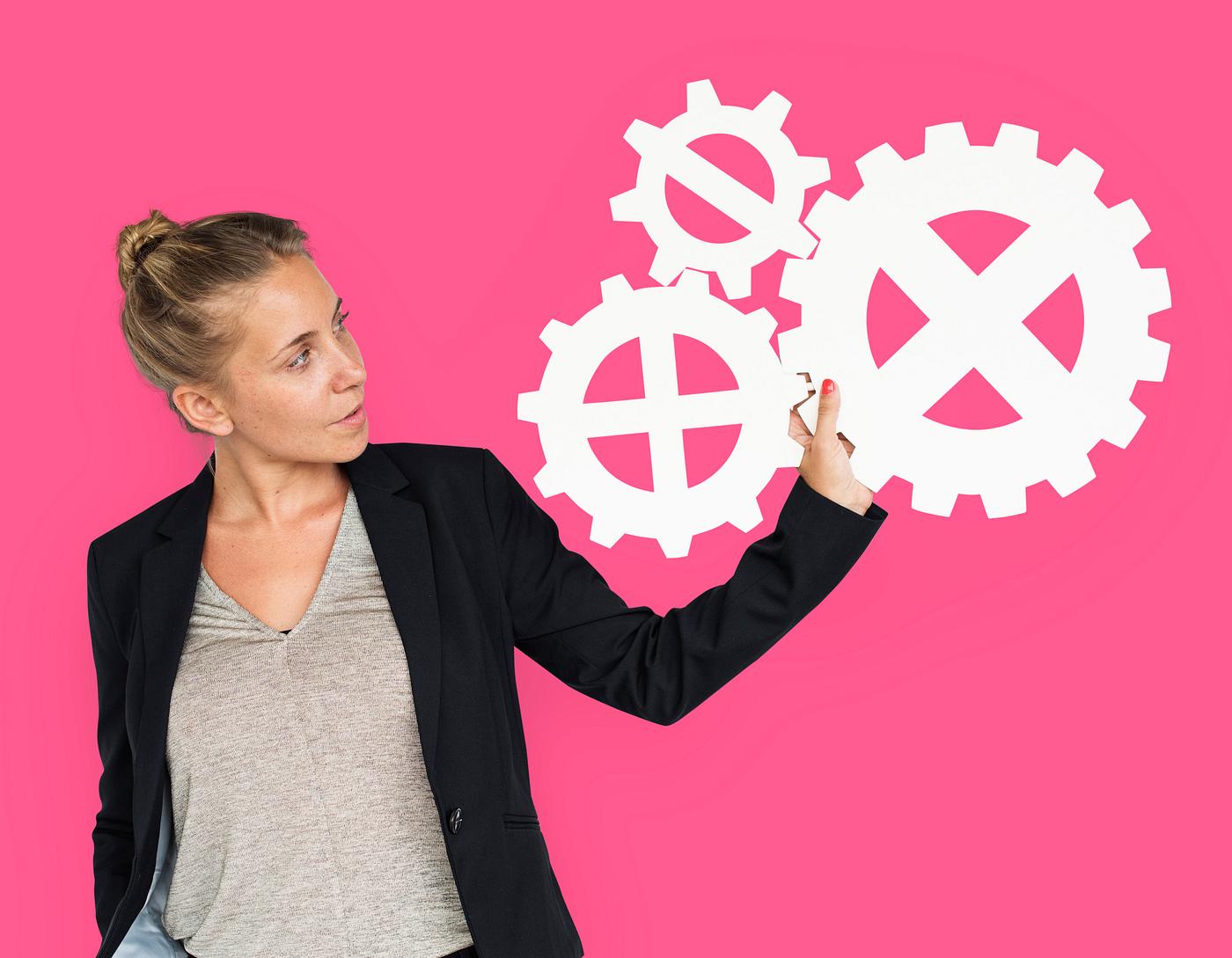 studio, expression, progress, person, holding, people, teamwork, gear, woman, pink, isolated, connection, symbol, engine,... studio, expression, progress, person, holding, people, teamwork, gear, woman, pink, isolated, connection, symbol, engine,...