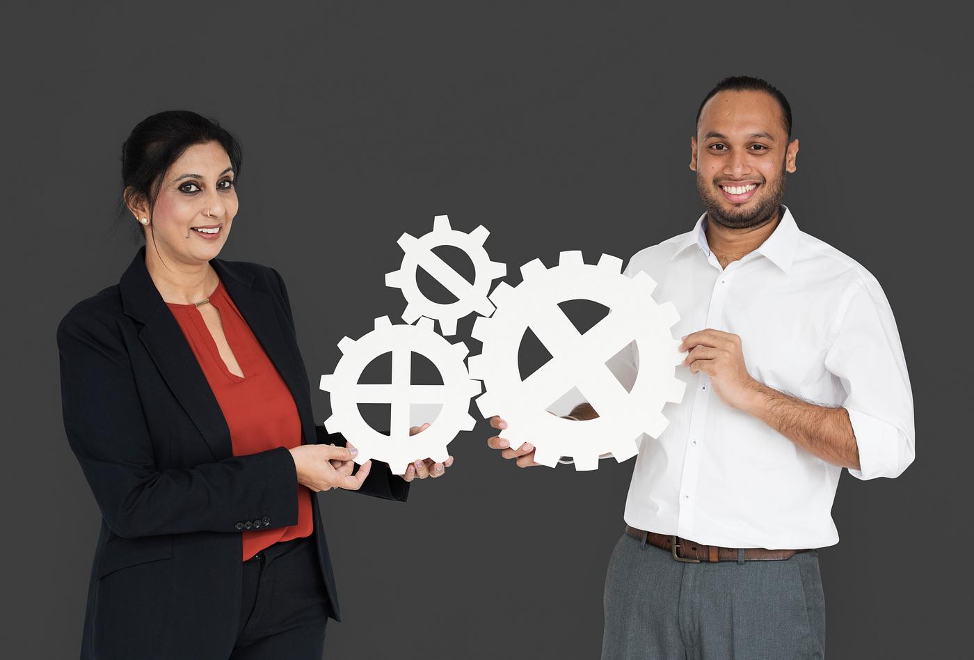 studio, progress, expression, person, holding, people, teamwork, gear, woman, cheerful, smiling, isolated, connection,... studio, progress, expression, person, holding, people, teamwork, gear, woman, cheerful, smiling, isolated, connection,...