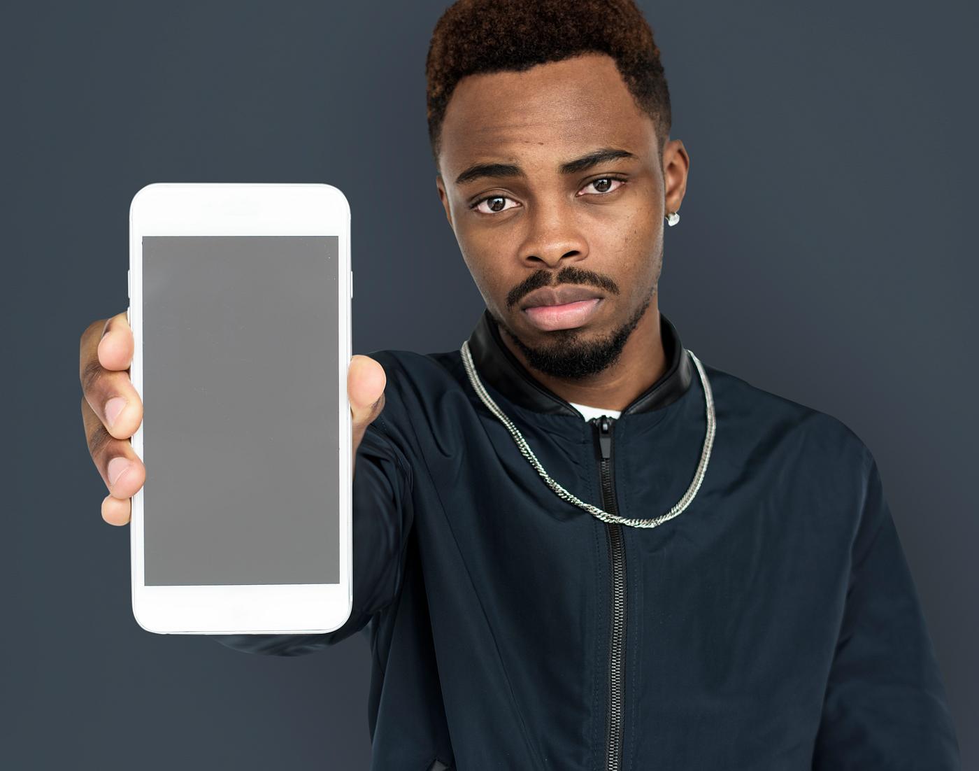 african descent, background, beard, black, communication, device, emotion, expression, focused, holding, holding phone,... african descent, background, beard, black, communication, device, emotion, expression, focused, holding, holding phone,...