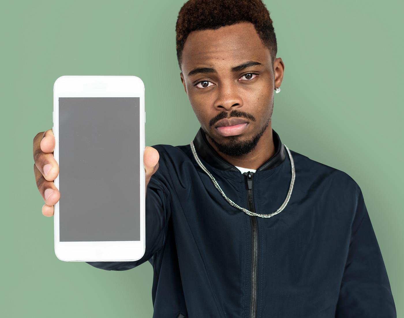 african descent, background, beard, black, communication, device, emotion, expression, focused, holding, holding phone,... african descent, background, beard, black, communication, device, emotion, expression, focused, holding, holding phone,...