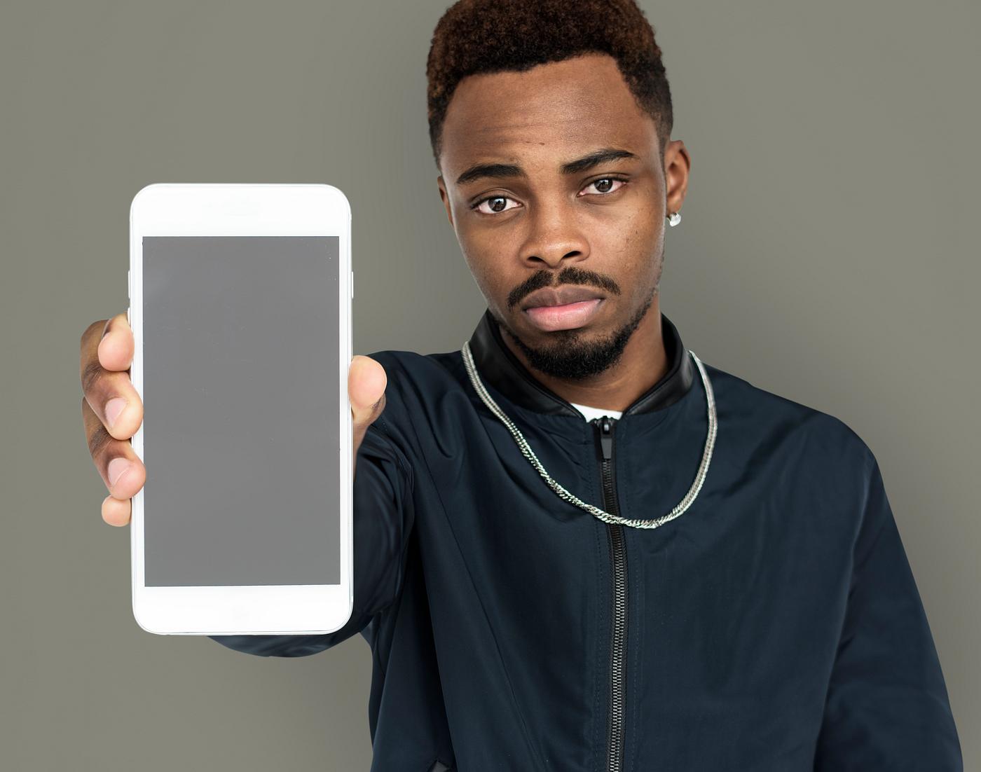 african descent, background, beard, black, communication, device, emotion, expression, focused, holding, holding phone,... african descent, background, beard, black, communication, device, emotion, expression, focused, holding, holding phone,...