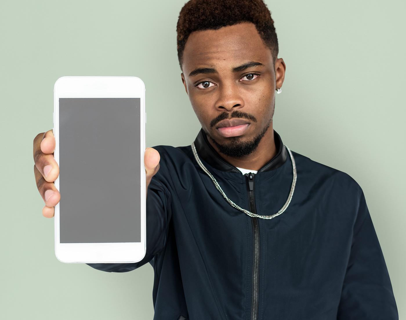 african descent, background, beard, black, communication, device, emotion, expression, focused, holding, holding phone,... african descent, background, beard, black, communication, device, emotion, expression, focused, holding, holding phone,...