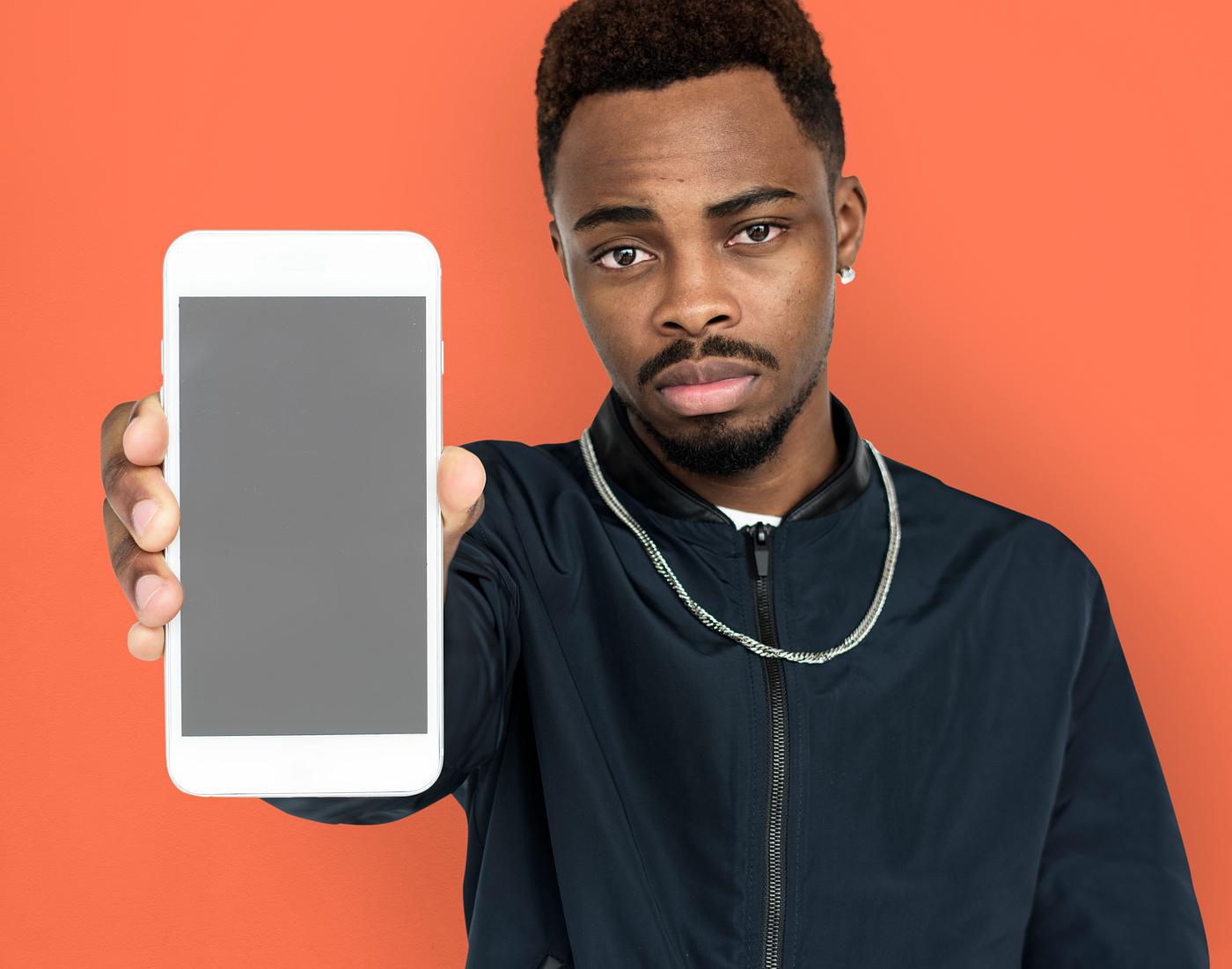 african descent, background, beard, black, communication, device, emotion, expression, focused, holding, holding phone,... african descent, background, beard, black, communication, device, emotion, expression, focused, holding, holding phone,...