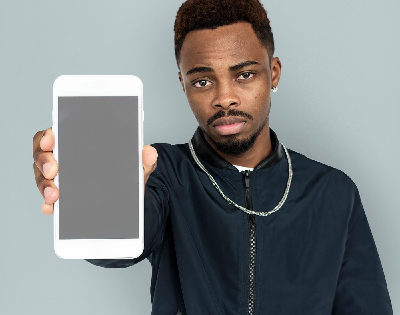african descent, background, beard, black, communication, device, emotion, expression, focused, holding, holding phone,... african descent, background, beard, black, communication, device, emotion, expression, focused, holding, holding phone,...