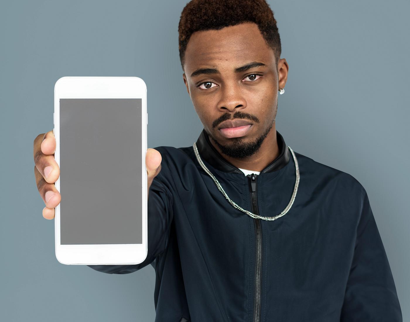 african descent, background, beard, black, communication, device, emotion, expression, focused, holding, holding phone,... african descent, background, beard, black, communication, device, emotion, expression, focused, holding, holding phone,...