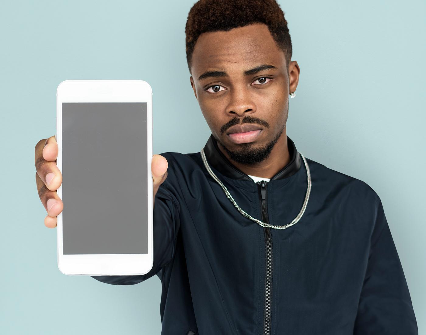 african descent, background, beard, black, communication, device, emotion, expression, focused, holding, holding phone,... african descent, background, beard, black, communication, device, emotion, expression, focused, holding, holding phone,...