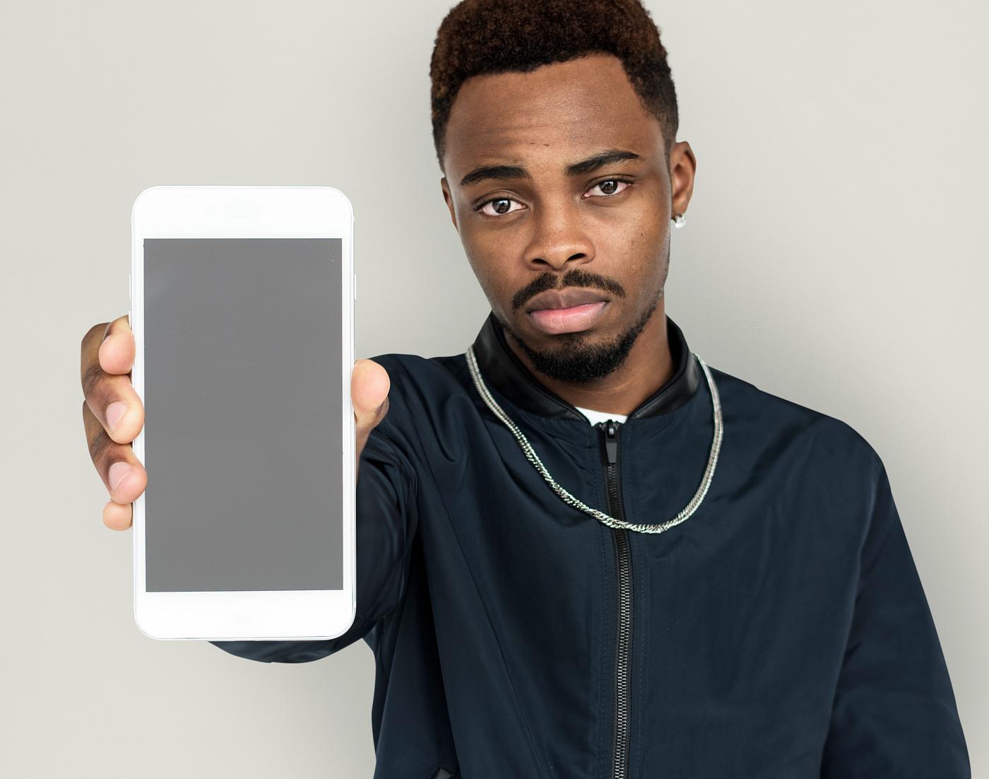 african descent, background, beard, black, communication, device, emotion, expression, focused, holding, holding phone,... african descent, background, beard, black, communication, device, emotion, expression, focused, holding, holding phone,...