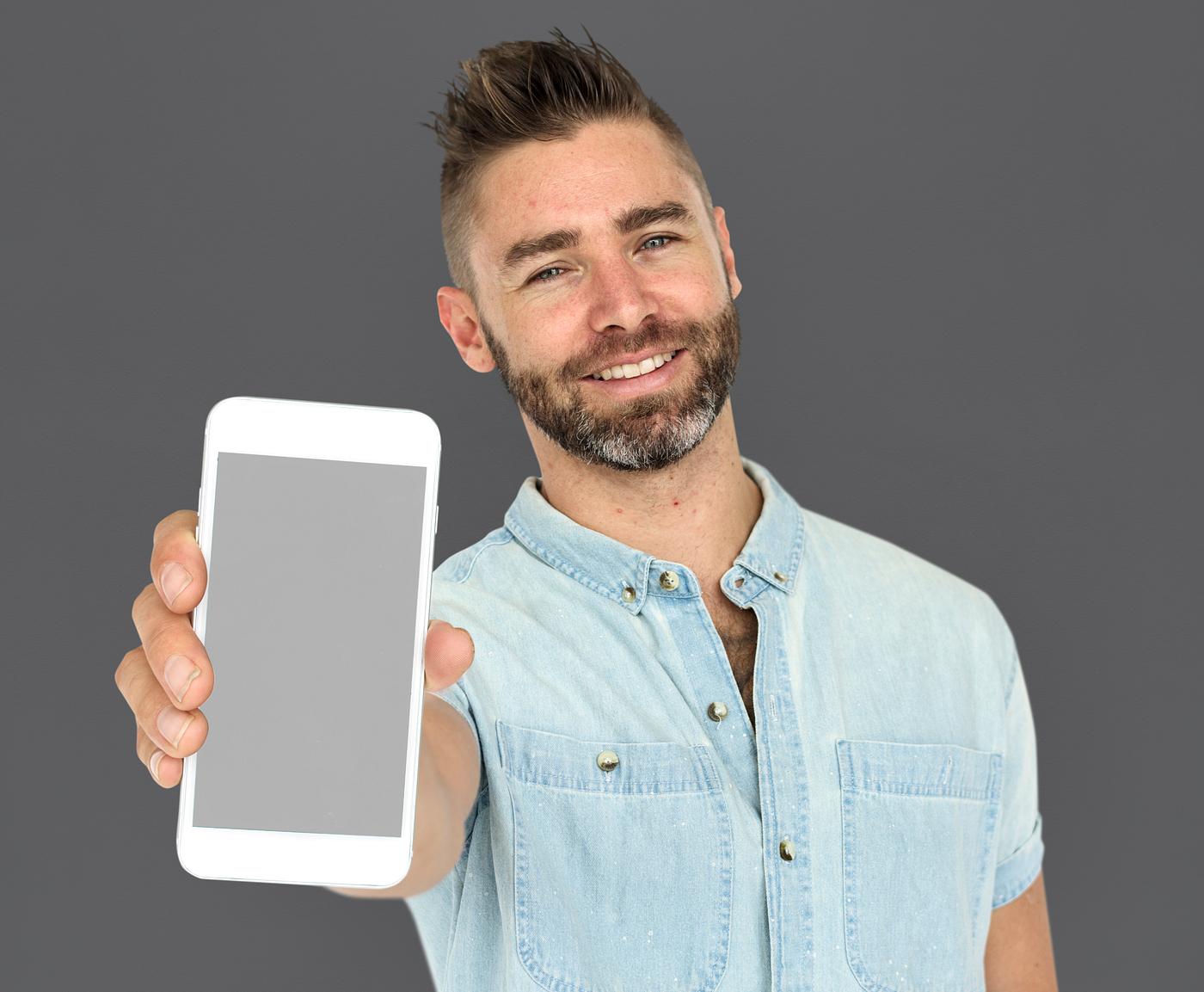 background, beard, caucasian, communication, device, emotion, expression, grey, holding, holding phone, isolated, male, man... background, beard, caucasian, communication, device, emotion, expression, grey, holding, holding phone, isolated, male, man...