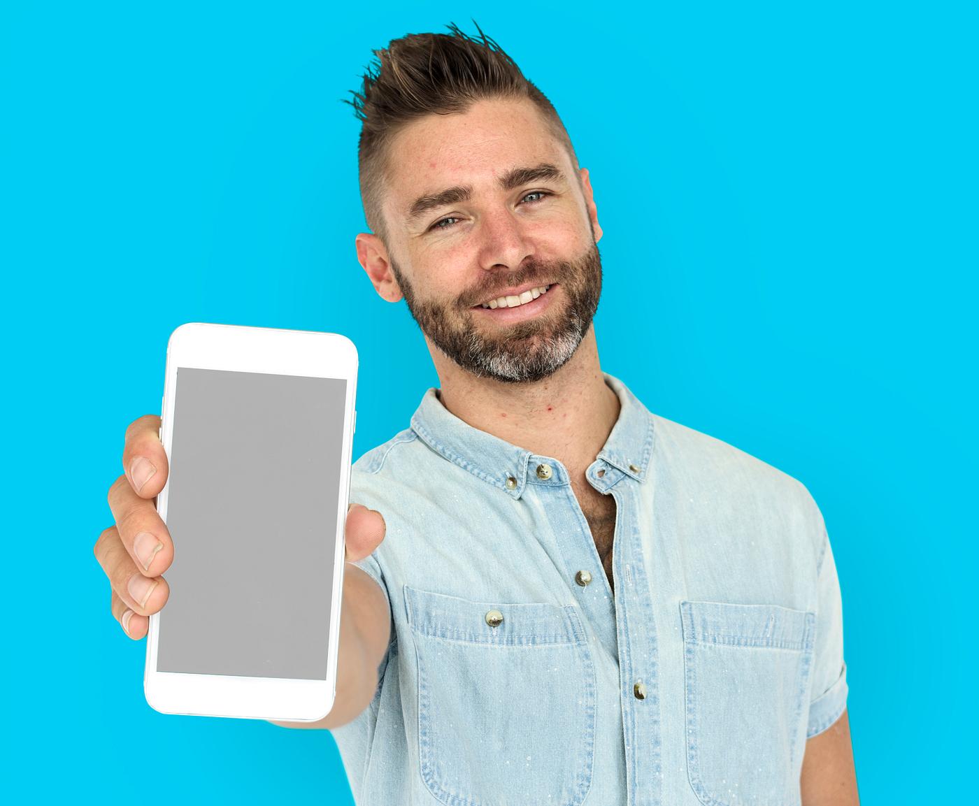 background, beard, blue, caucasian, communication, device, emotion, expression, holding, holding phone, isolated, male, man... background, beard, blue, caucasian, communication, device, emotion, expression, holding, holding phone, isolated, male, man...