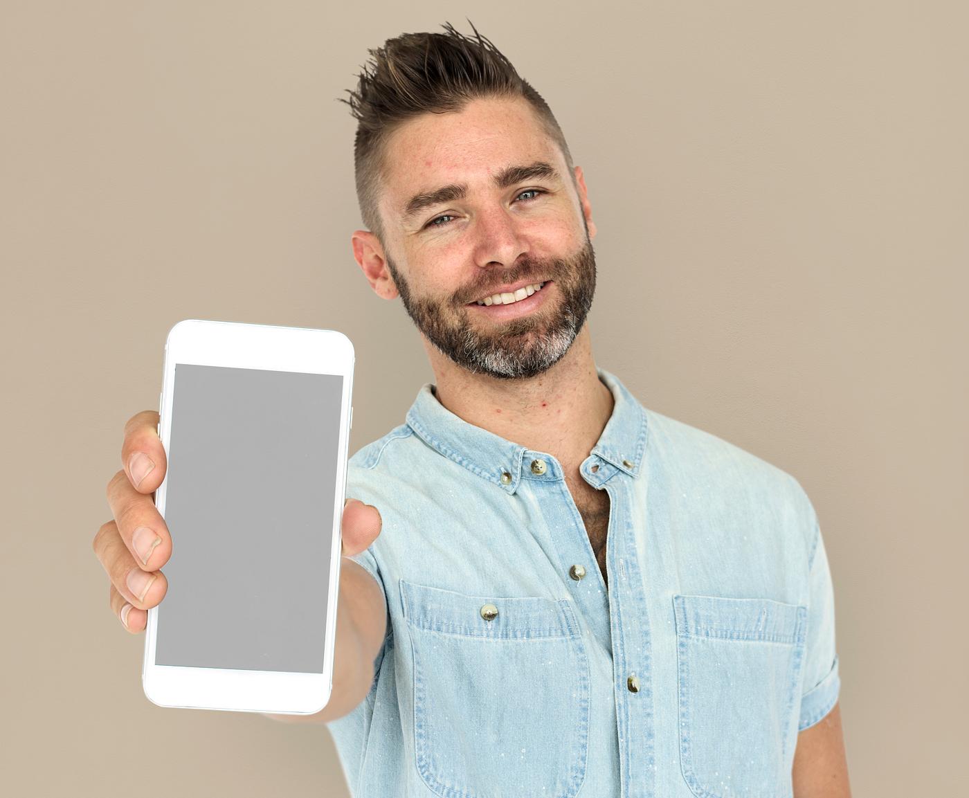 background, beard, brown, caucasian, communication, device, emotion, expression, holding, holding phone, isolated, male, man... background, beard, brown, caucasian, communication, device, emotion, expression, holding, holding phone, isolated, male, man...