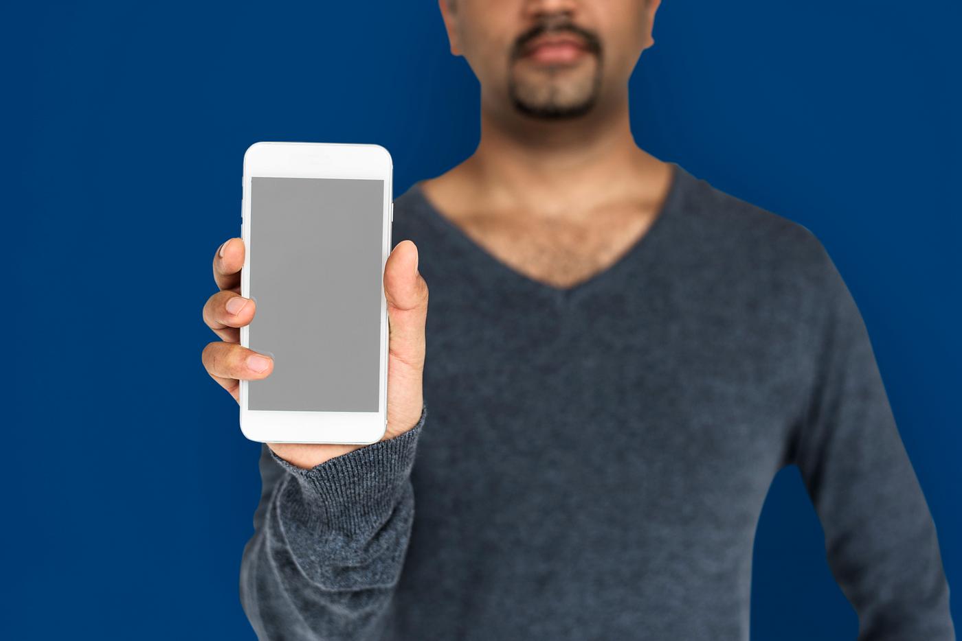 african descent, background, beard, black, blue, communication, device, emotion, expression, focused, holding, holding phone... african descent, background, beard, black, blue, communication, device, emotion, expression, focused, holding, holding phone...