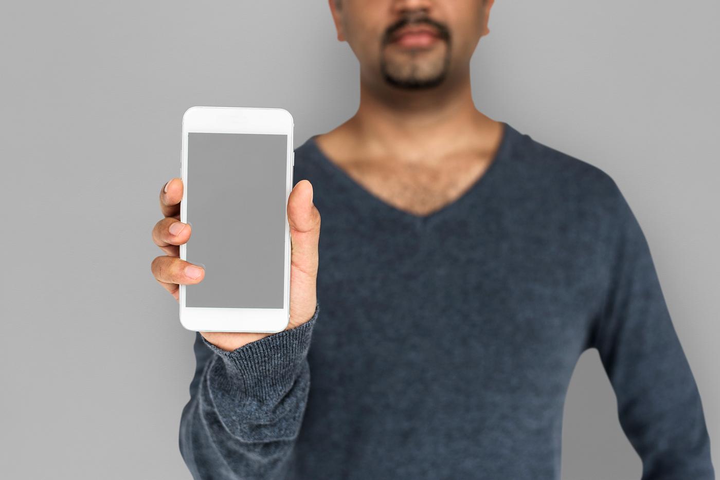 african descent, background, beard, black, communication, device, emotion, expression, focused, grey, holding, holding phone... african descent, background, beard, black, communication, device, emotion, expression, focused, grey, holding, holding phone...