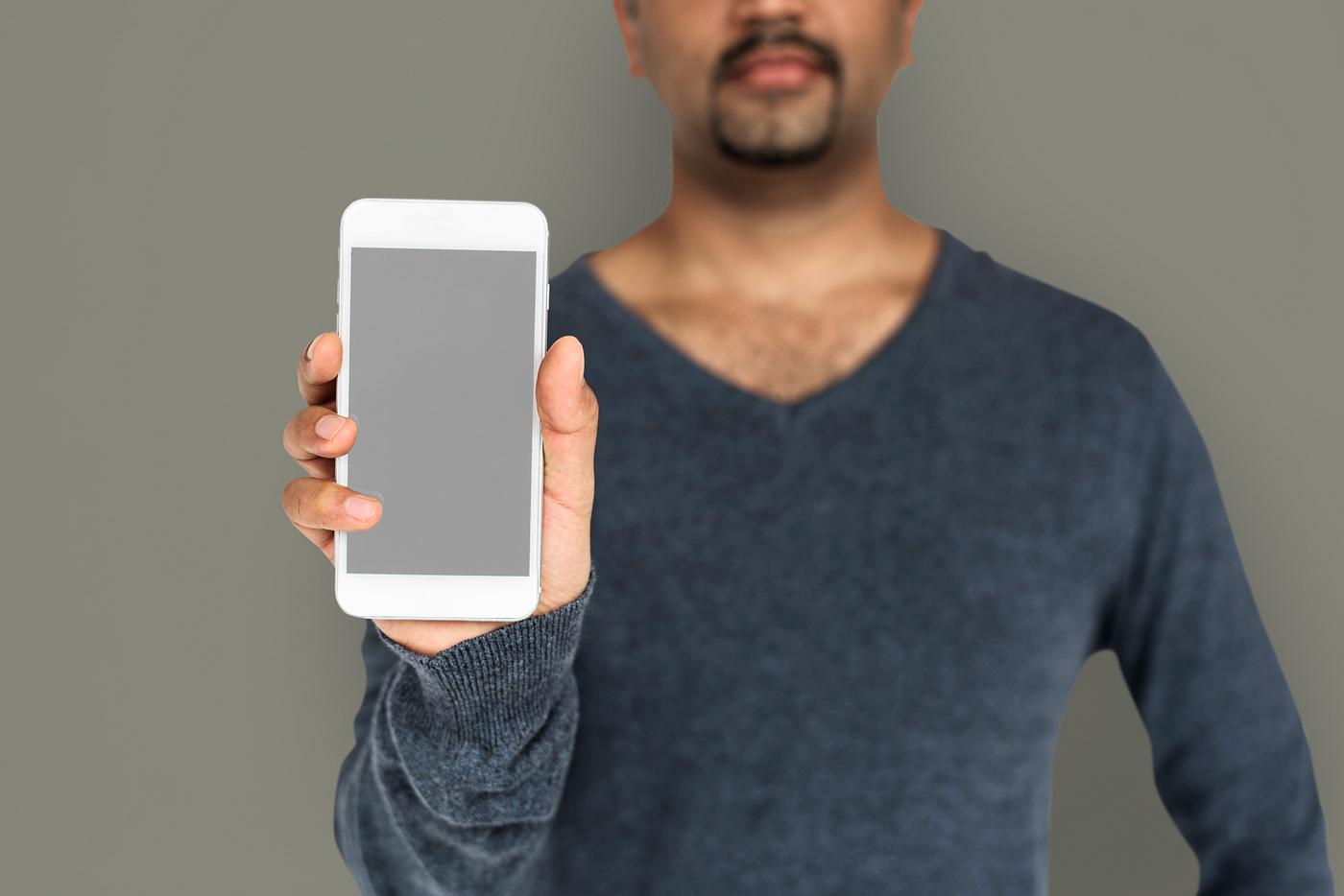 african descent, background, beard, black, brown, communication, device, emotion, expression, focused, holding, holding... african descent, background, beard, black, brown, communication, device, emotion, expression, focused, holding, holding...
