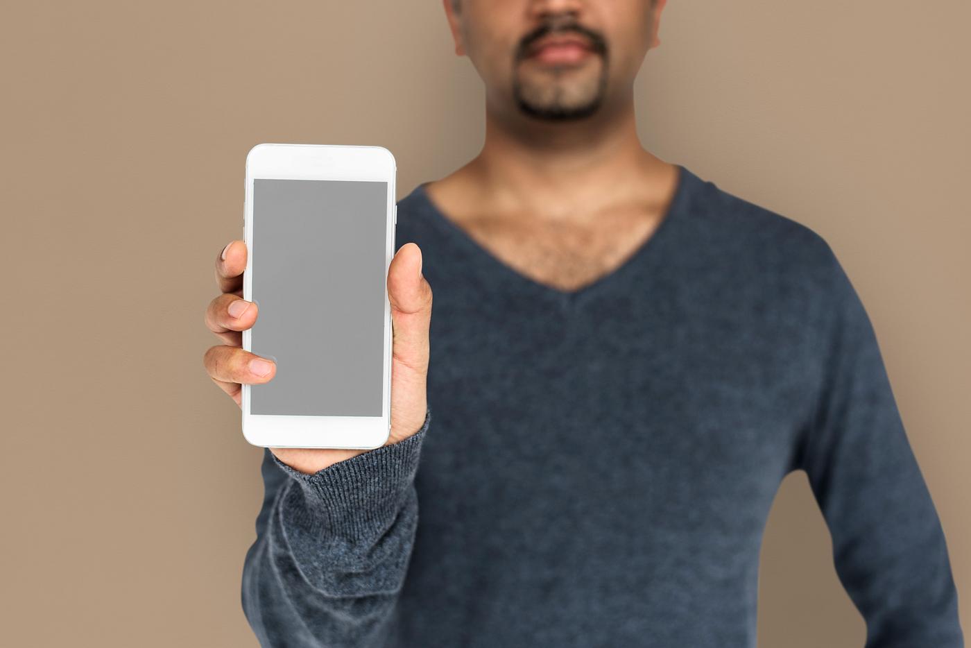 african descent, background, beard, black, brown, communication, device, emotion, expression, focused, holding, holding... african descent, background, beard, black, brown, communication, device, emotion, expression, focused, holding, holding...
