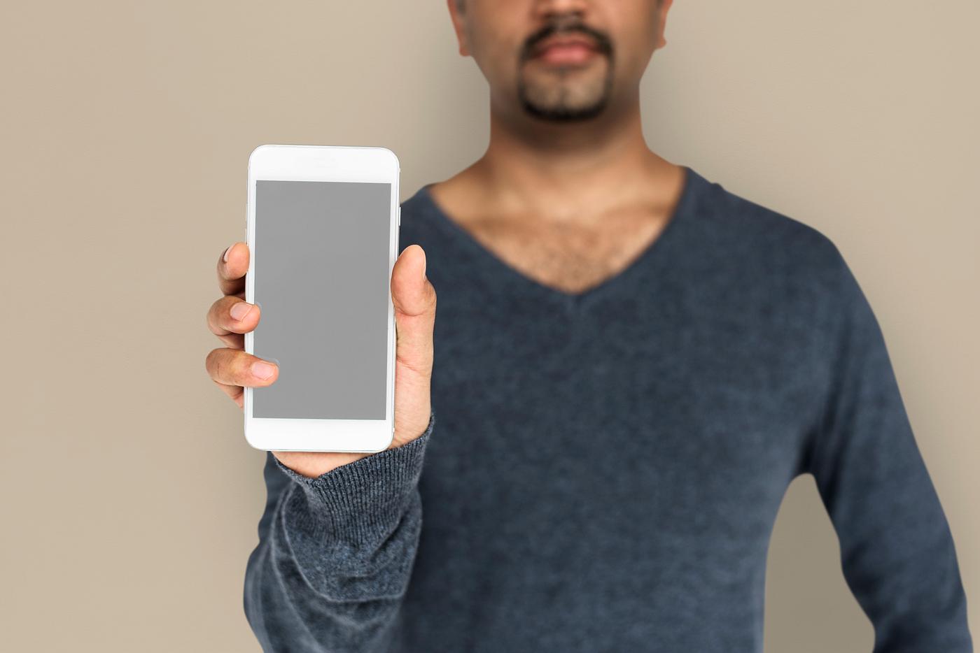 african descent, background, beard, black, brown, communication, device, emotion, expression, focused, holding, holding... african descent, background, beard, black, brown, communication, device, emotion, expression, focused, holding, holding...