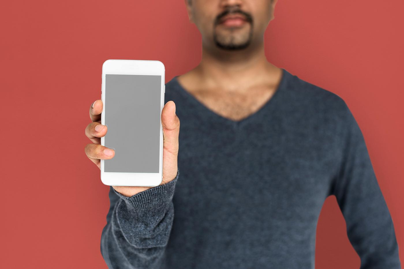 african descent, background, beard, black, brown, communication, device, emotion, expression, focused, holding, holding... african descent, background, beard, black, brown, communication, device, emotion, expression, focused, holding, holding...