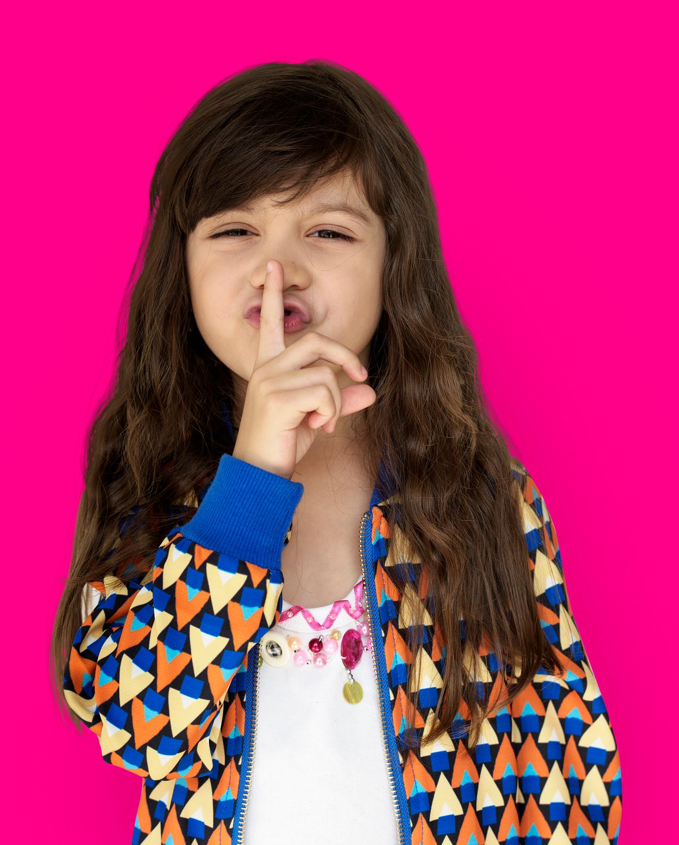 studio, expression, person, people, finger on lips, kid, solo, pink, childhood, shh, smile, cheerful, smiling, isolated,... studio, expression, person, people, finger on lips, kid, solo, pink, childhood, shh, smile, cheerful, smiling, isolated,...