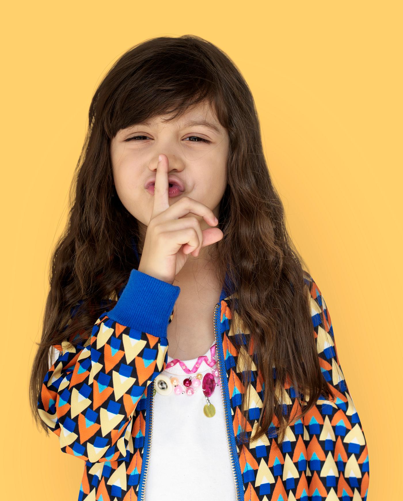 studio, expression, person, yellow, people, finger on lips, kid, solo, childhood, shh, smile, cheerful, smiling, isolated,... studio, expression, person, yellow, people, finger on lips, kid, solo, childhood, shh, smile, cheerful, smiling, isolated,...