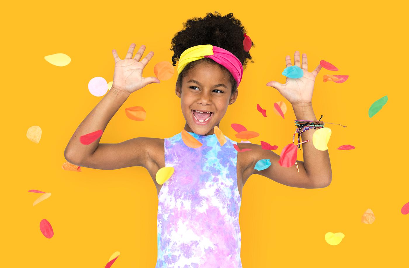 adorable, african descent, arms raised, background, celebration, charming, cheerful, child, childhood, confetti, cute,... adorable, african descent, arms raised, background, celebration, charming, cheerful, child, childhood, confetti, cute,...