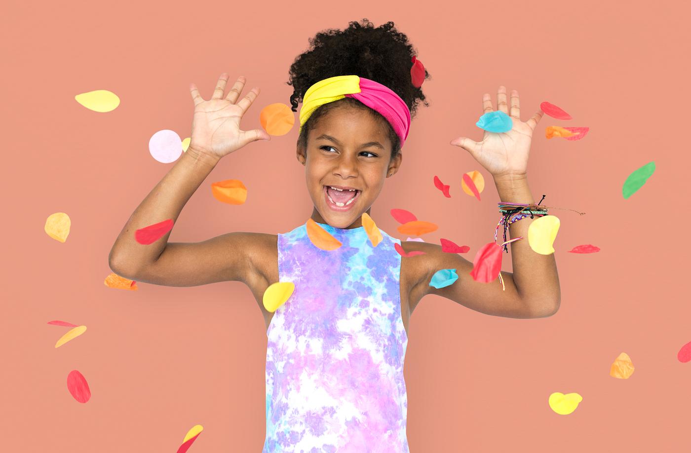 adorable, african descent, arms raised, background, celebration, charming, cheerful, child, childhood, confetti, cute,... adorable, african descent, arms raised, background, celebration, charming, cheerful, child, childhood, confetti, cute,...