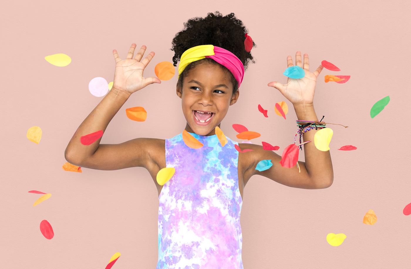 adorable, african descent, arms raised, background, celebration, charming, cheerful, child, childhood, confetti, cute,... adorable, african descent, arms raised, background, celebration, charming, cheerful, child, childhood, confetti, cute,...