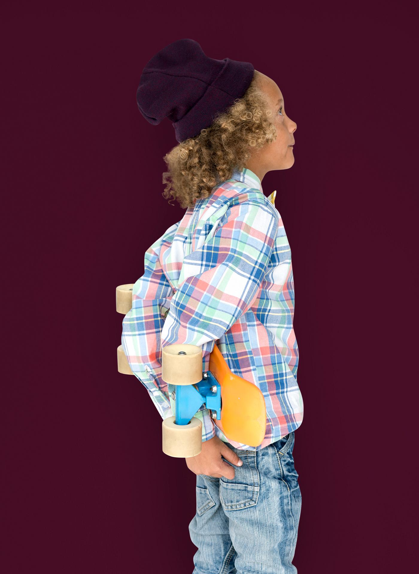 Boy holding a skateboard behind his back - expression, studio, person, beanie, little, people, kid, child, pose, childish,... Boy holding a skateboard behind his back - expression, studio, person, beanie, little, people, kid, child, pose, childish,...