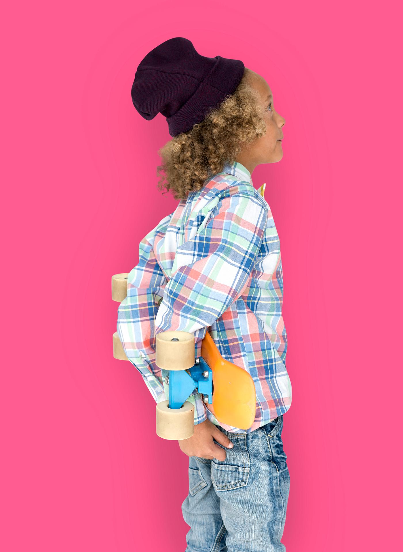Boy holding a skateboard behind his back - expression, studio, person, beanie, little, people, kid, child, pose, childish,... Boy holding a skateboard behind his back - expression, studio, person, beanie, little, people, kid, child, pose, childish,...