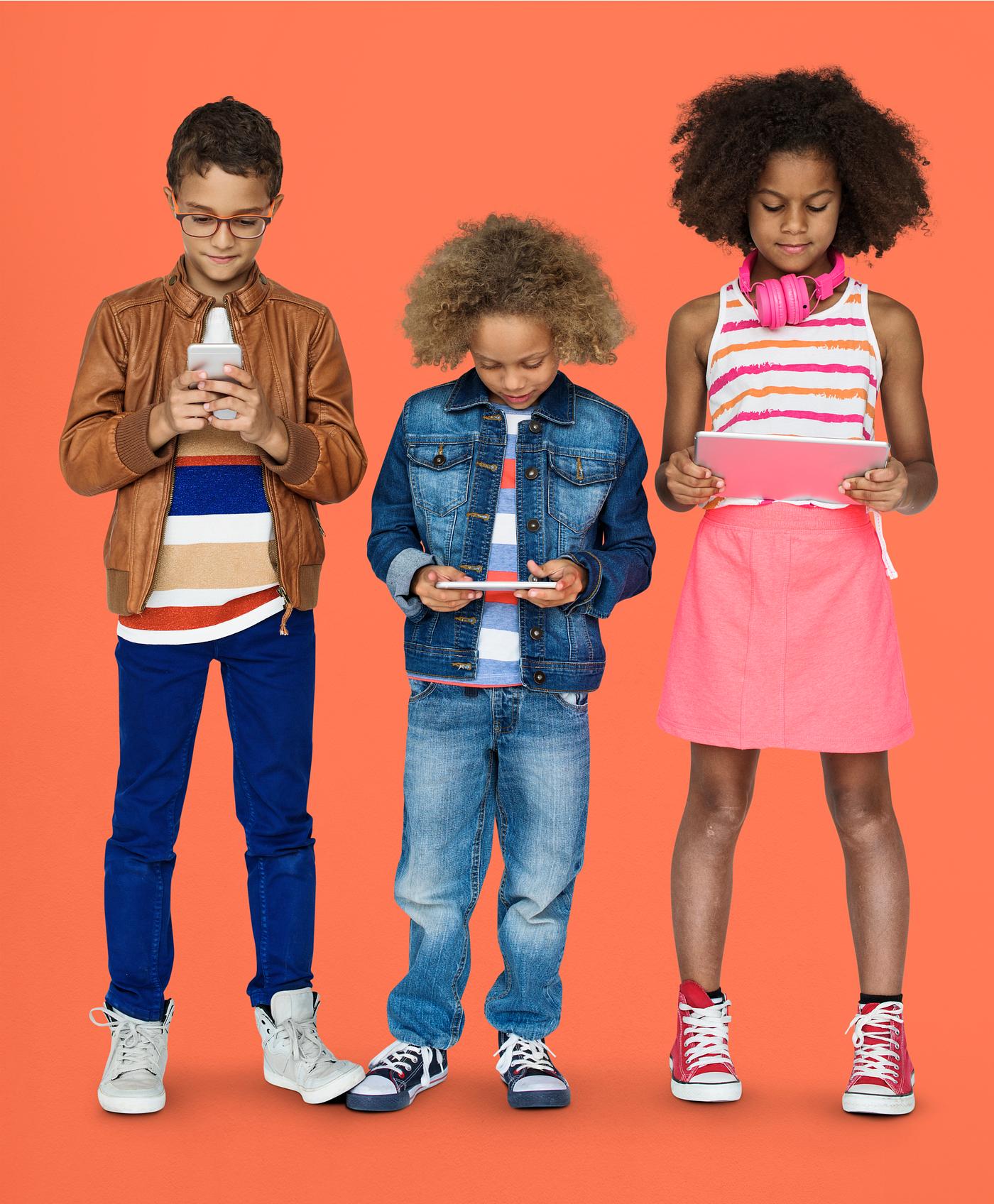 Kids using their digital devices Kids using their digital devices